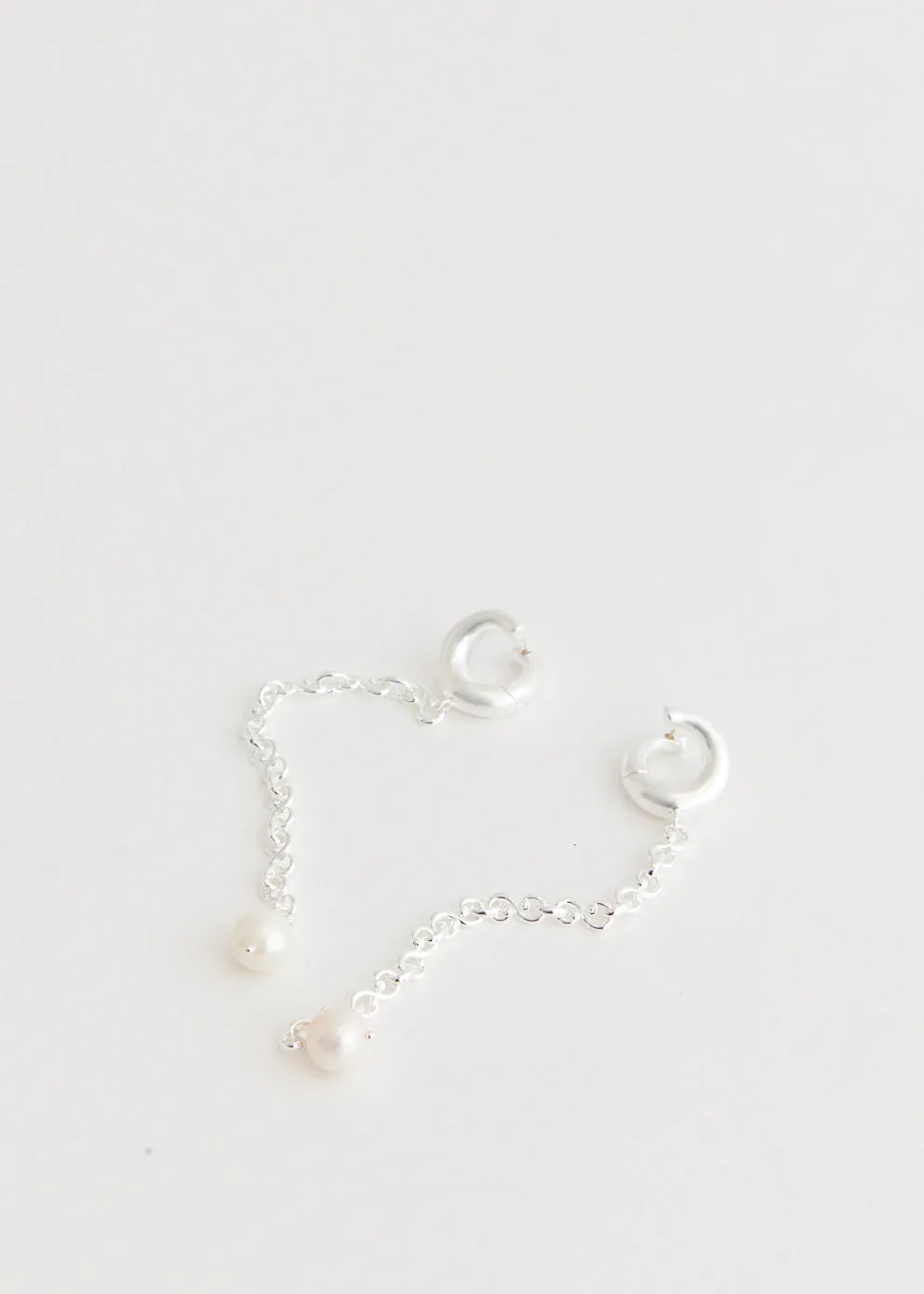 Miriam Long Pearl Shoulder Grazer Earrings
